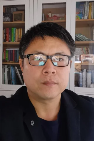 Hongwei Wu tpc主席.jpg